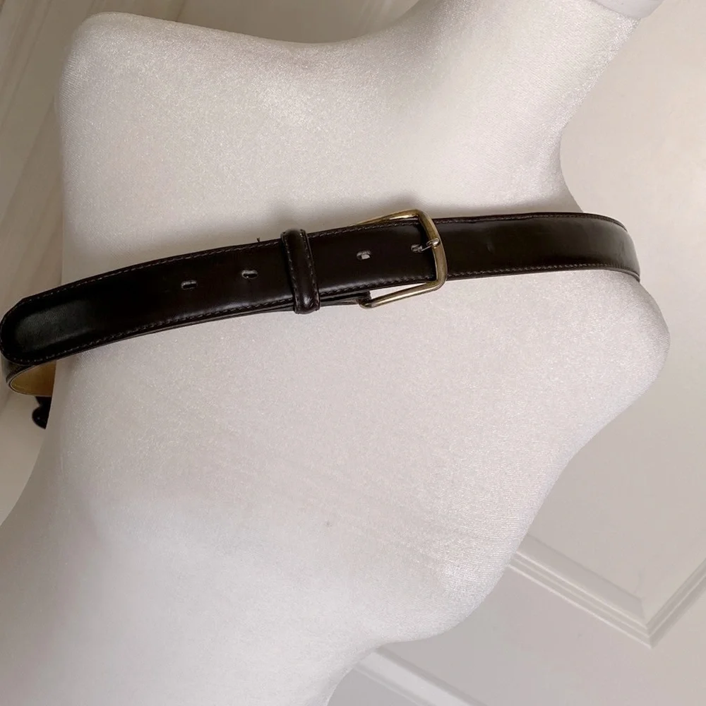 men’s brown leather belt size 40’. No brand listed.